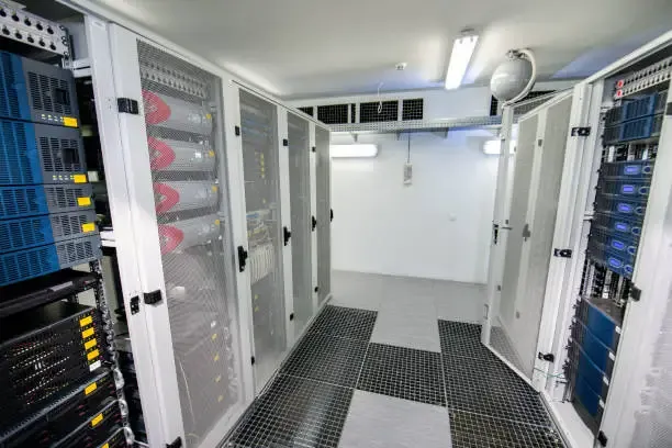 Industrial Servers In Metal Cabinets In The Server Room